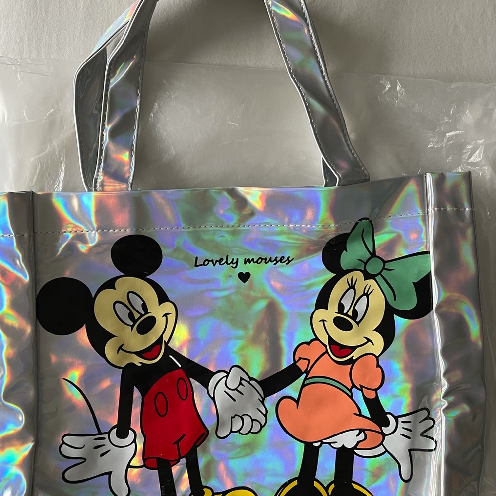 Mickey & Minnie Mouse iridescent tote bag.